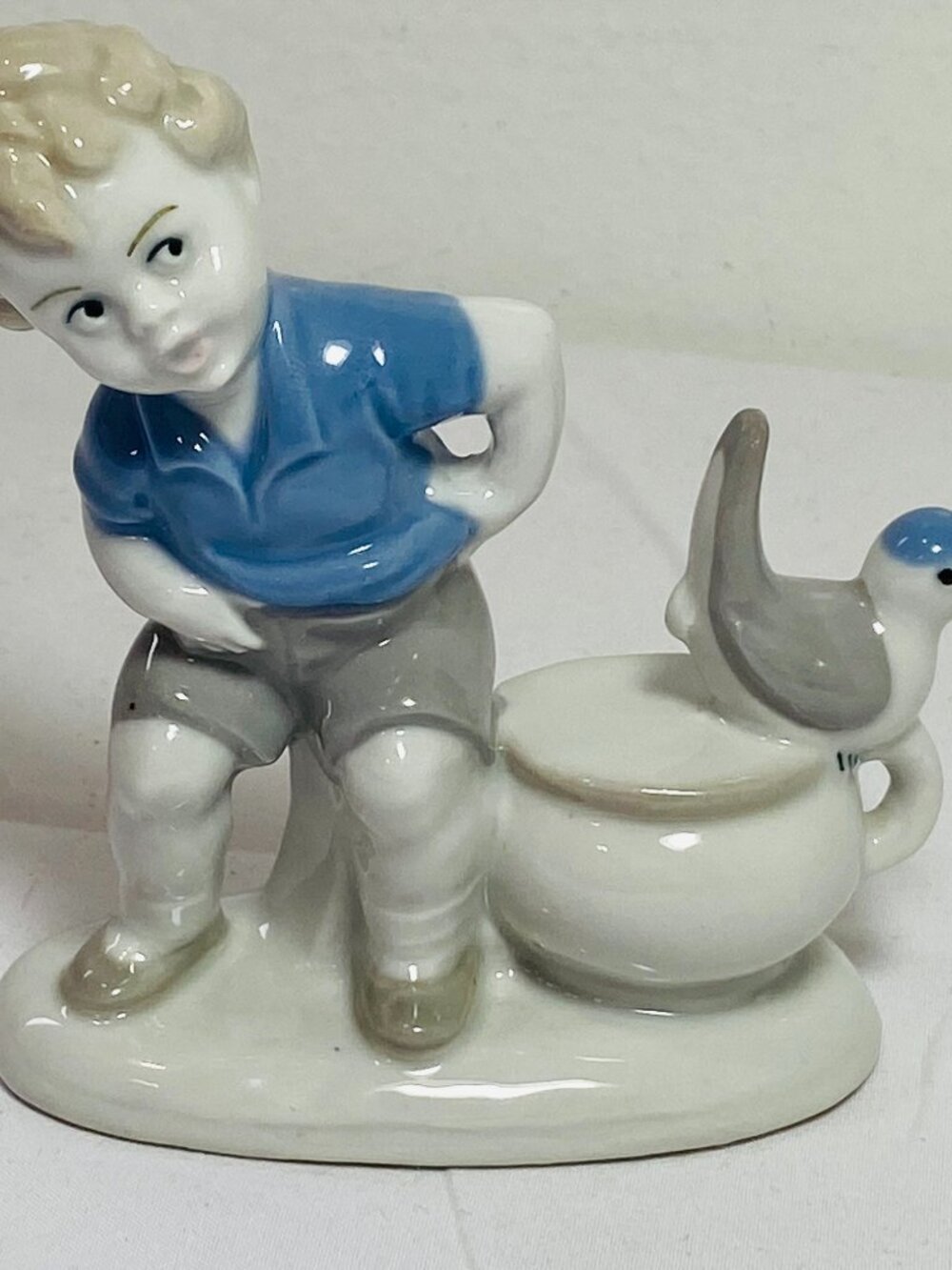 VNTG Gerold Porzellan Glazed Ceramic Figure Boy Blue Shirt Bird GDR Lippelsdorf
